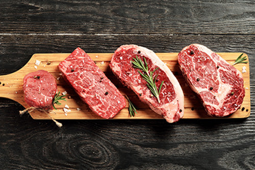 Various cuts of raw steak